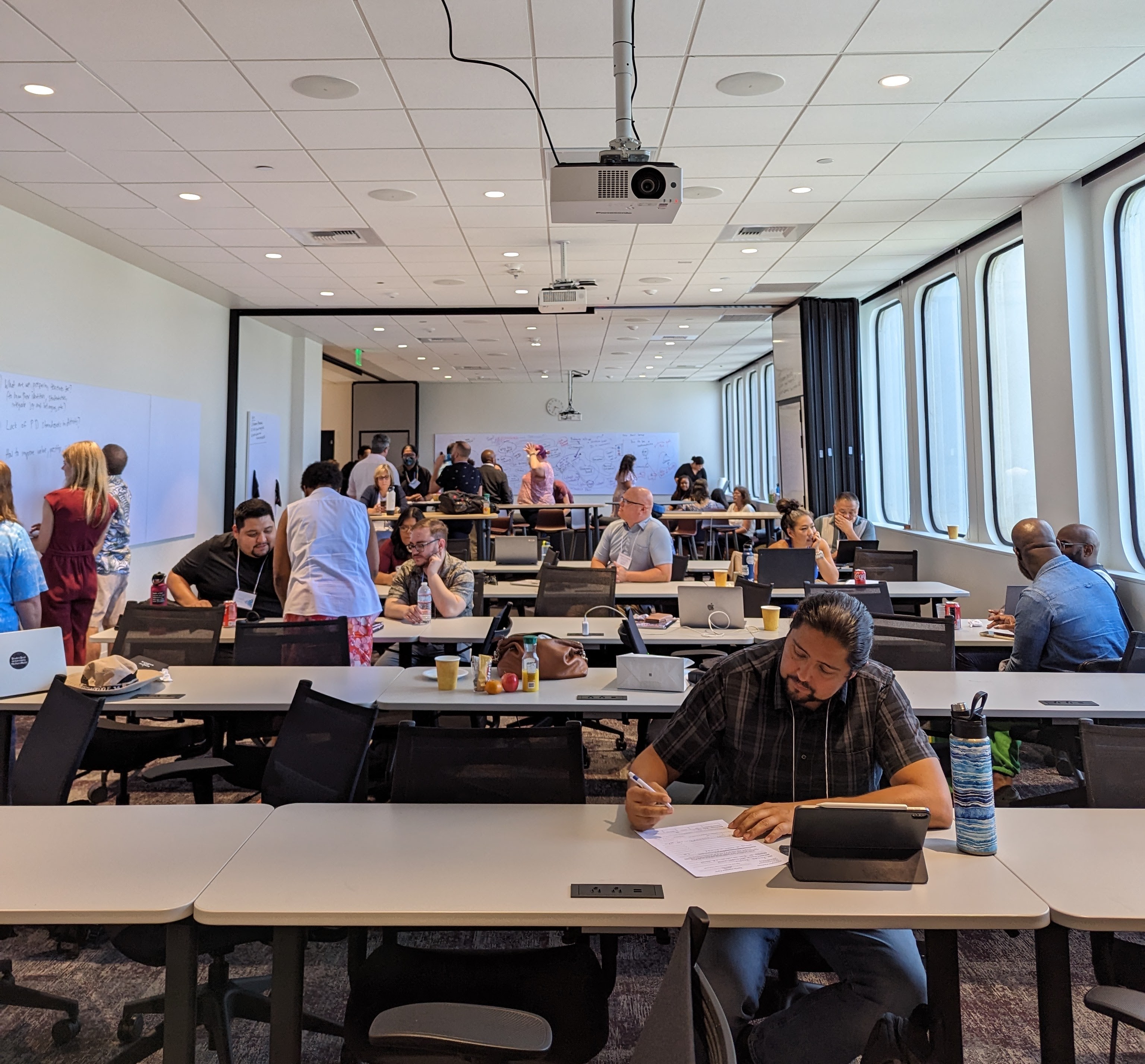 People working on problems in the lecture room at AIM